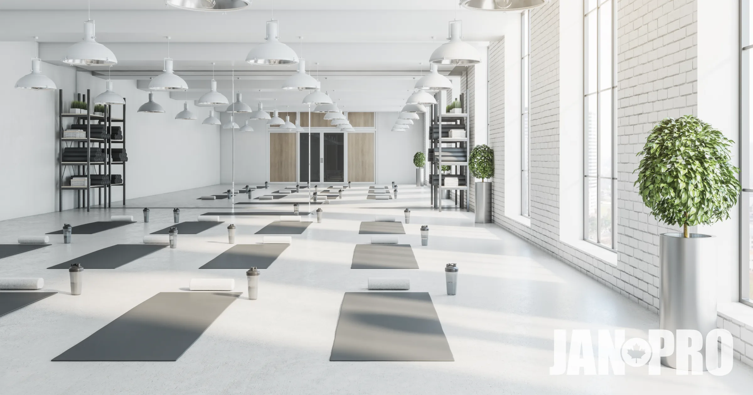 Calming and clean gym space set for a yoga class.